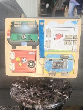 Melissa & Doug Lock-and-Latch Busy Board - Red, Green, Blue, Yellow, White